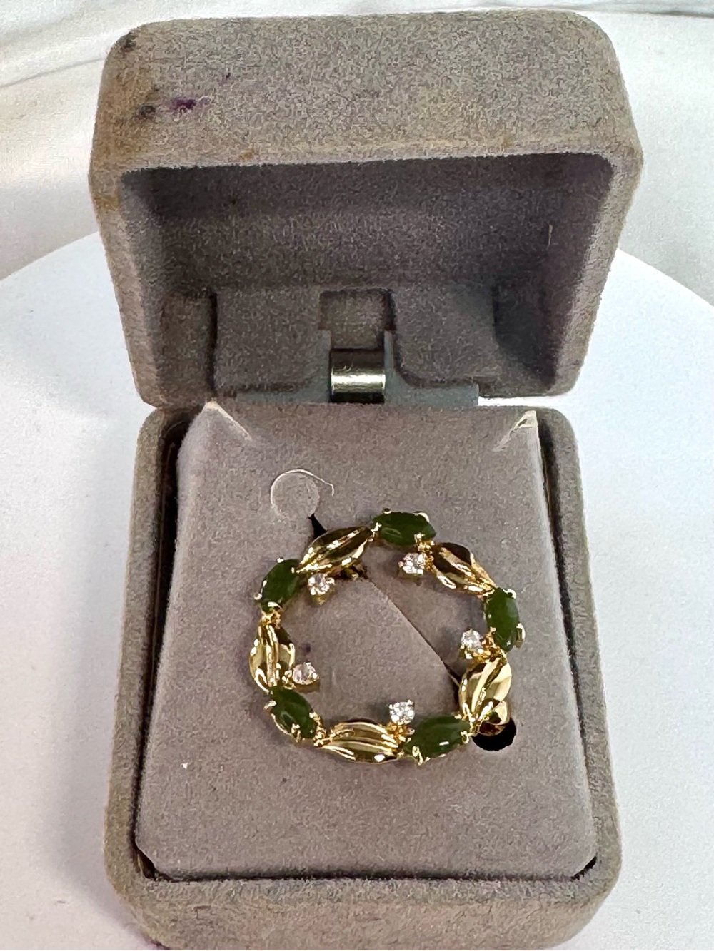 Gold Tone Wreath Brooch with Green Stones and Clear Crystals